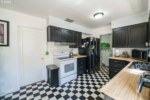 kitchen with washing machine and clothes dryer, light tile patterned floors, dark brown cabinetry, white electric range, and black fridge