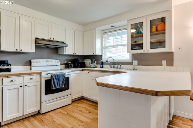 kitchen with white cabinetry, white electric stove, light hardwood / wood-style flooring, and sink