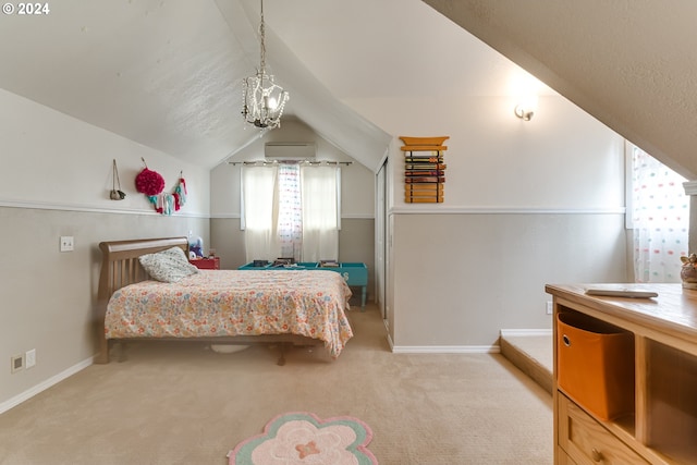 bedroom featuring lofted ceiling, a wall unit AC, and light carpet