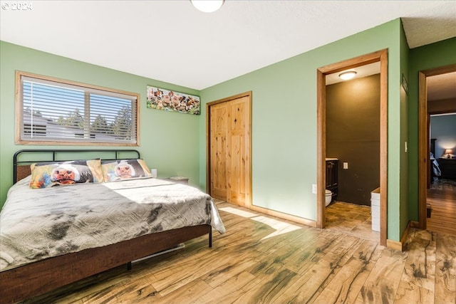 bedroom featuring light hardwood / wood-style flooring