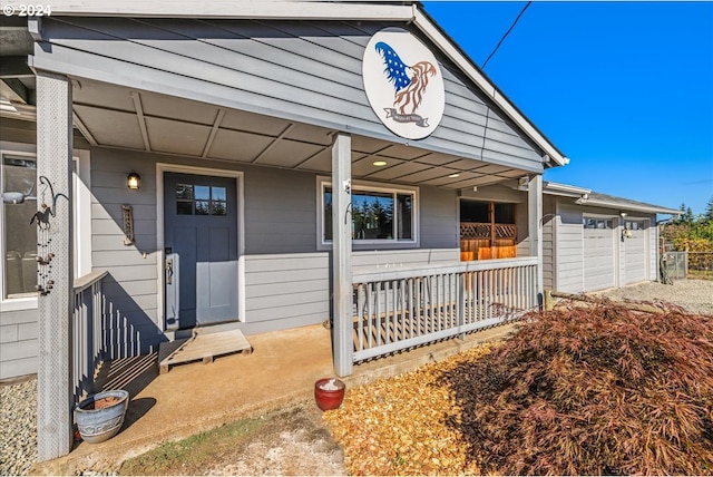 view of side of property featuring a porch