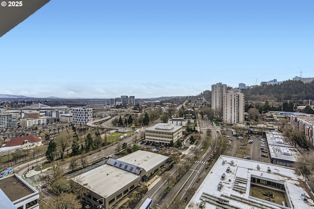 birds eye view of property with a view of city