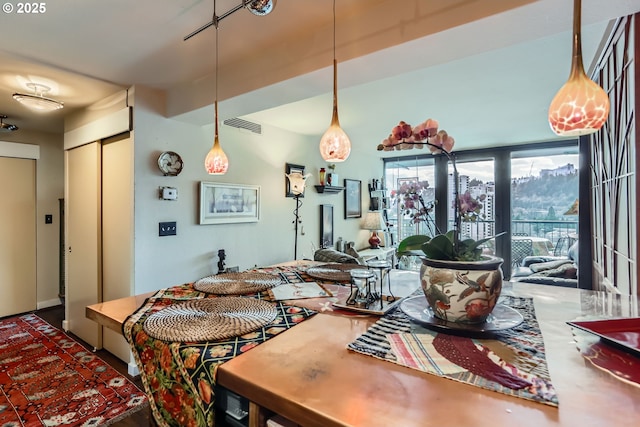 dining area featuring visible vents