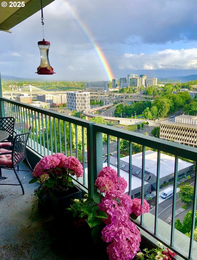 balcony featuring a view of city