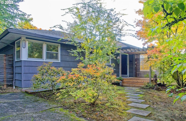 6312 SW Lesser Way, Portland, OR 97219 - view of front facade featuring a pergola
