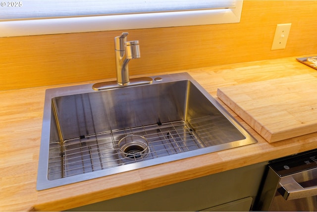 6312 SW Lesser Way, Portland, OR 97219 - kitchen view of a sink and butcher block countertops