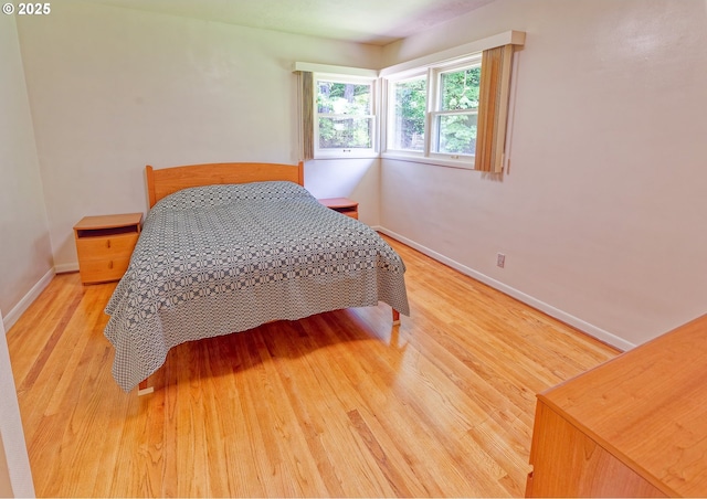 6312 SW Lesser Way, Portland, OR 97219 - bedroom with wood finished floors and baseboards