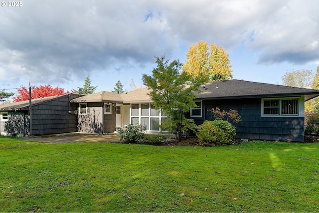 6312 SW Lesser Way, Portland, OR 97219 - rear view of house with a lawn