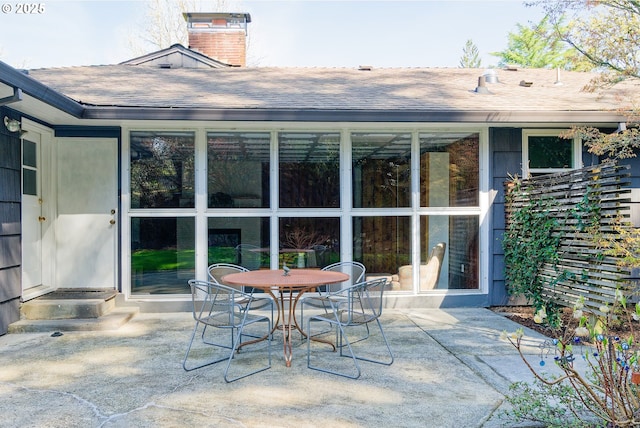 6312 SW Lesser Way, Portland, OR 97219 - view of patio with a sunroom and outdoor dining area