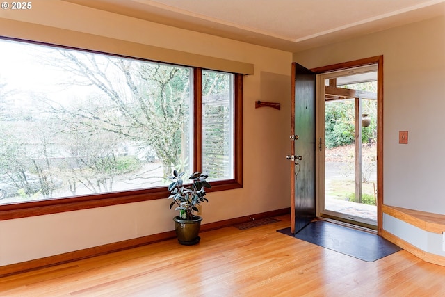 6312 SW Lesser Way, Portland, OR 97219 - doorway to outside featuring light wood-style flooring and plenty of natural light