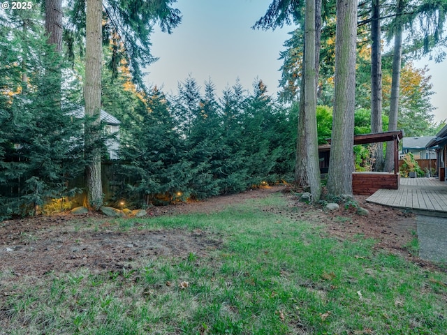 view of yard featuring a wooden deck