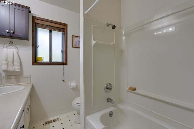 full bathroom featuring shower / tub combination, vanity, and toilet