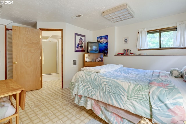 bedroom with a textured ceiling