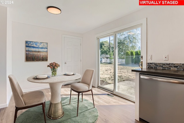 dining room featuring light wood-type flooring