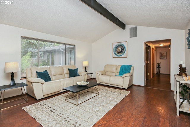 living room featuring a textured ceiling, lofted ceiling with beams, and dark hardwood / wood-style flooring