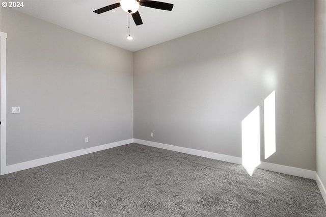 unfurnished room with carpet and ceiling fan