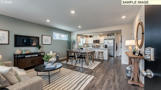 living room featuring dark hardwood / wood-style floors