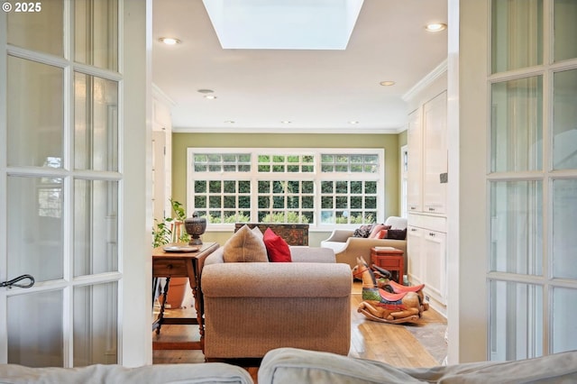 2670 SW Tichner Dr, Portland, OR 97205 - living room with ornamental molding, wood finished floors, and a skylight