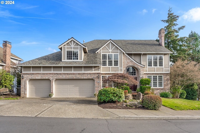 view of front of property with a garage