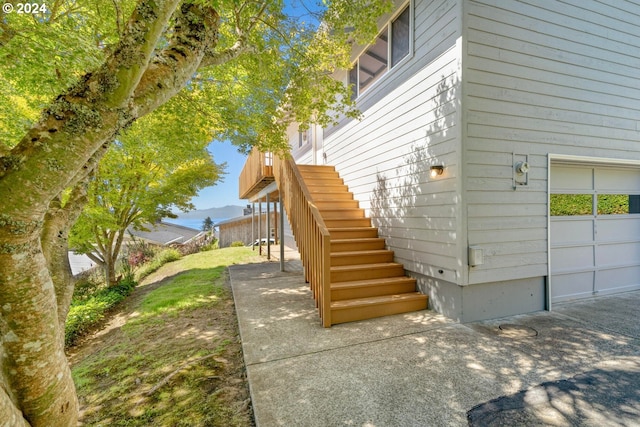 view of side of property with a garage