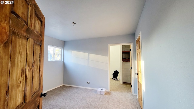 unfurnished bedroom with a closet