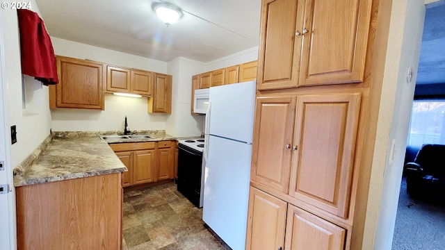 kitchen with sink, white appliances, and crown molding