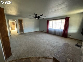 spare room featuring ceiling fan