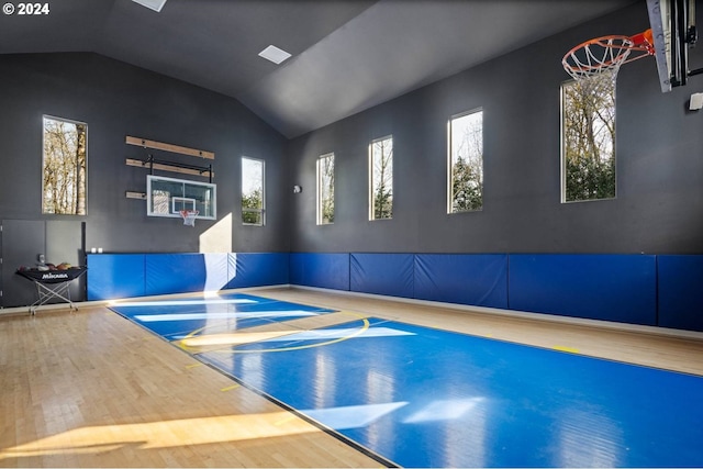 view of sport court featuring a wealth of natural light and community basketball court