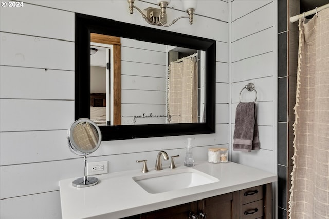 bathroom with vanity with extensive cabinet space