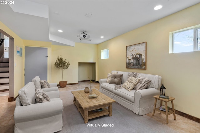 living room featuring light tile floors