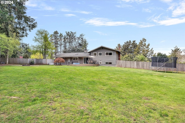 view of yard featuring a trampoline