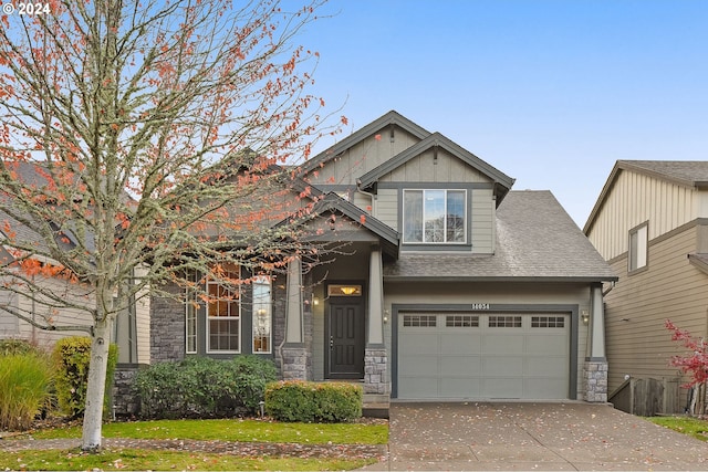 craftsman-style home featuring a garage