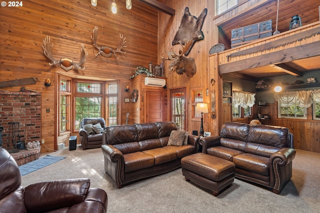 carpeted living room with wood walls, a towering ceiling, beam ceiling, and a wall unit AC