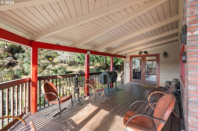 deck with area for grilling and french doors