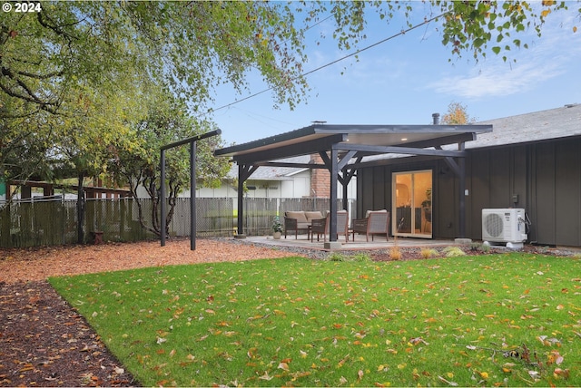 view of yard with a patio and ac unit