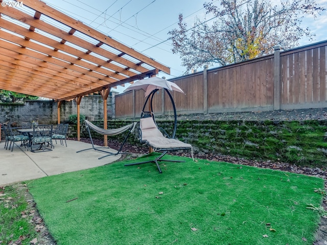 view of yard with a pergola and a patio area