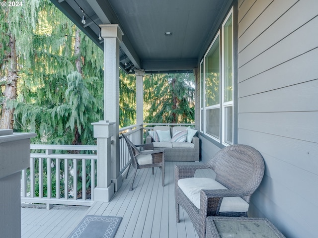 wooden deck featuring a porch