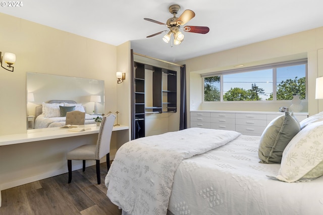 bedroom featuring dark hardwood / wood-style flooring and ceiling fan