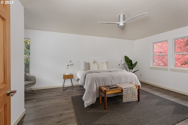 bedroom featuring dark hardwood / wood-style flooring and ceiling fan