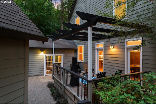 view of side of home featuring a pergola