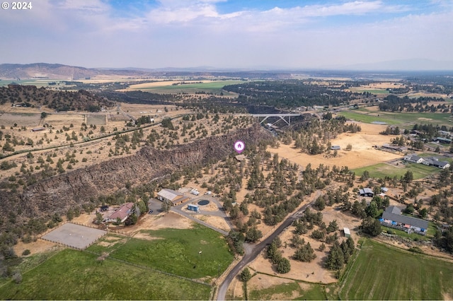 bird's eye view featuring a mountain view and a rural view