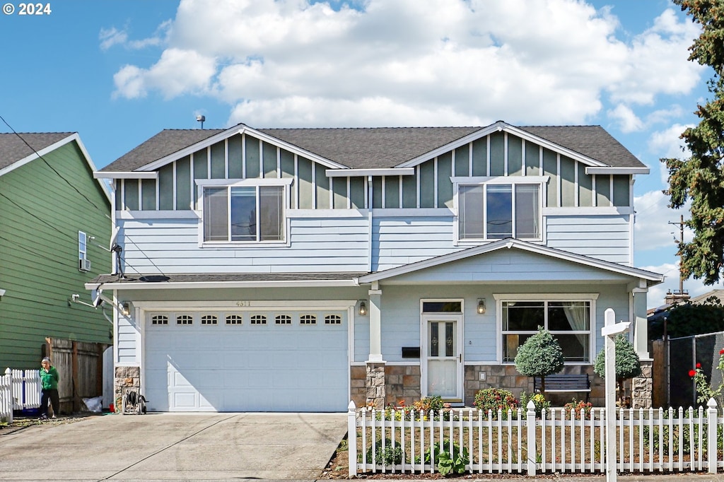 view of front of property featuring a garage