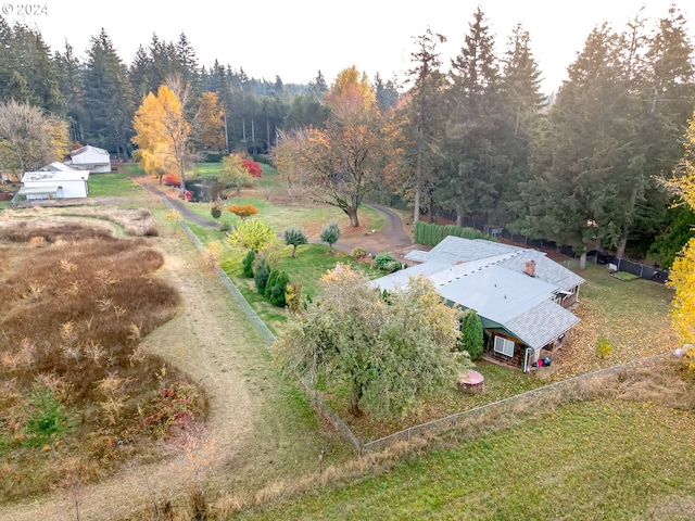 aerial view with a rural view and a view of trees