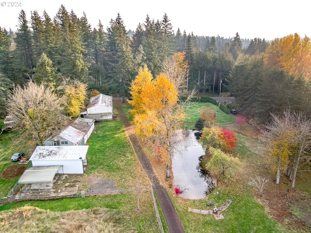 aerial view featuring a wooded view