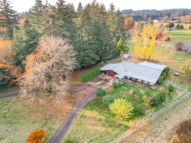 birds eye view of property featuring a rural view