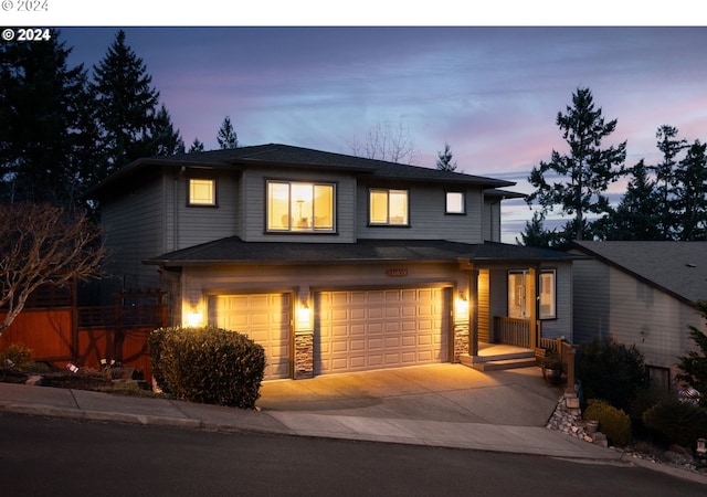 view of front of property featuring a garage