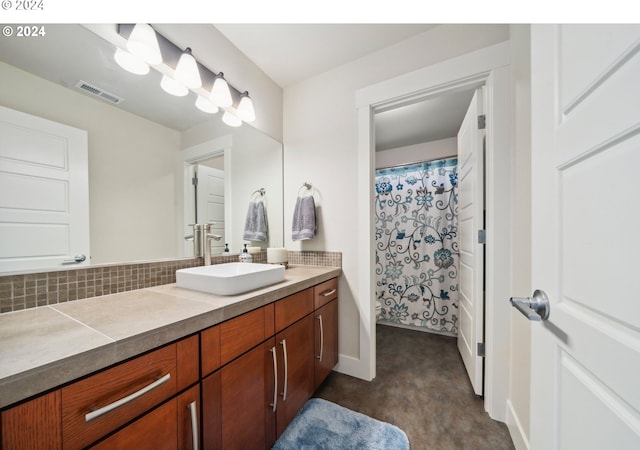 bathroom with vanity, tasteful backsplash, and a shower with shower curtain