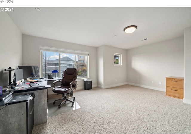 view of carpeted office space