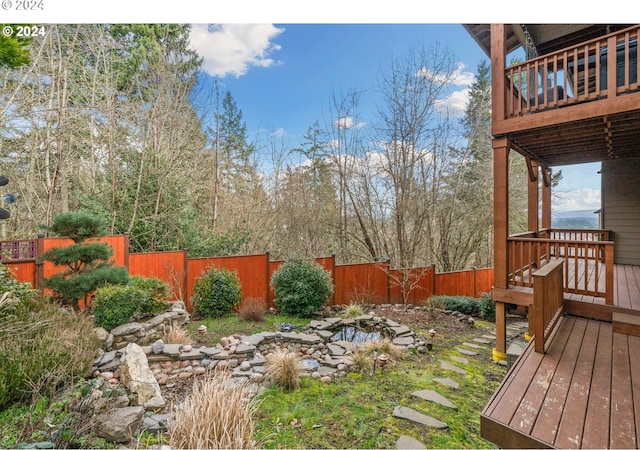 view of yard featuring a deck