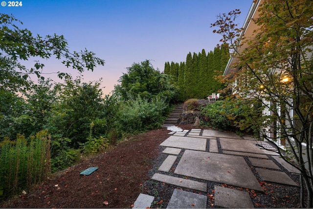 view of patio terrace at dusk